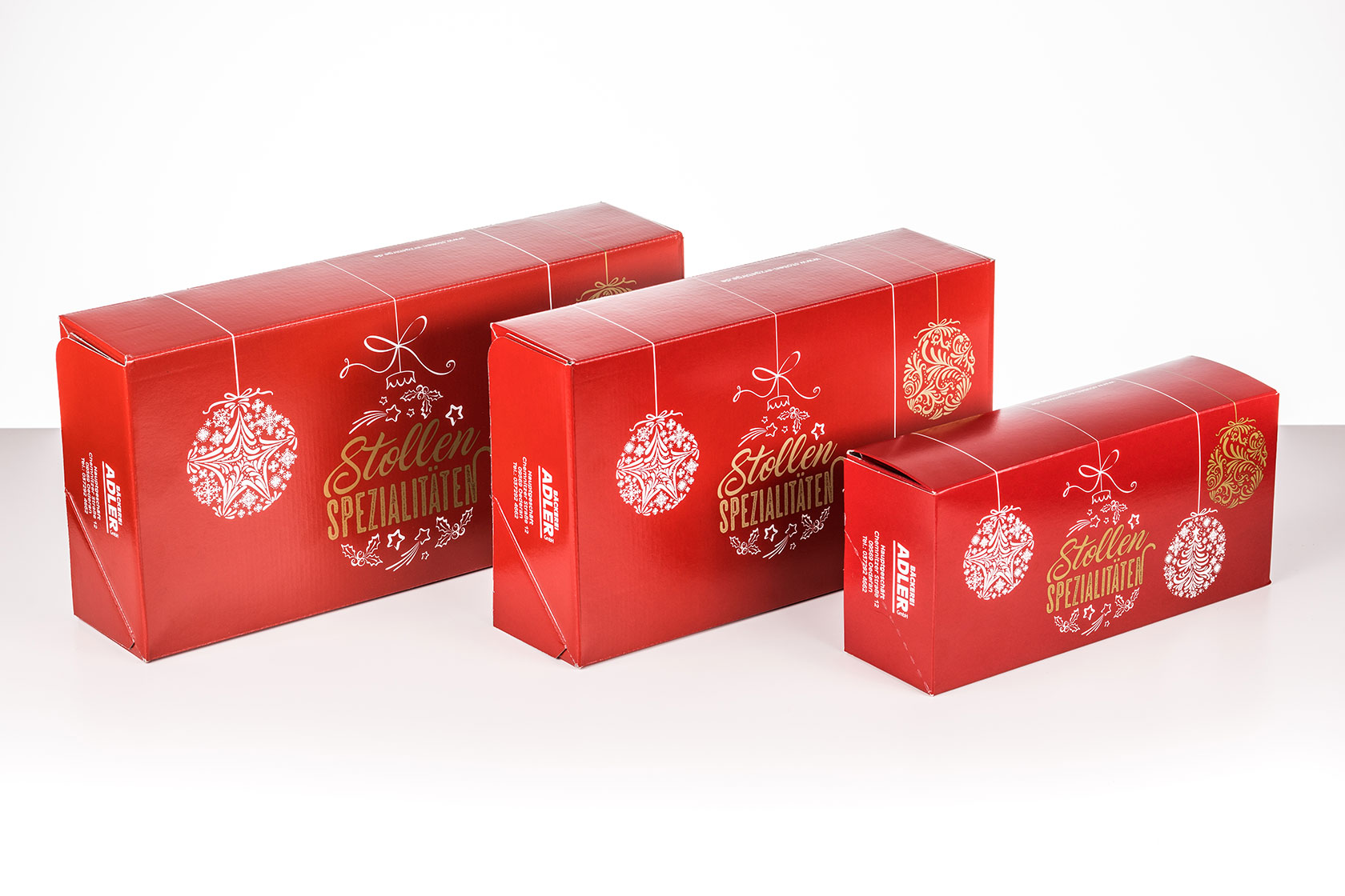 rote weihnachtliche Stollenverpackung in verschiedenen Größen